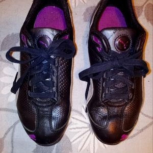 PUMA black leather tennis shoes.  Never touched the ground.